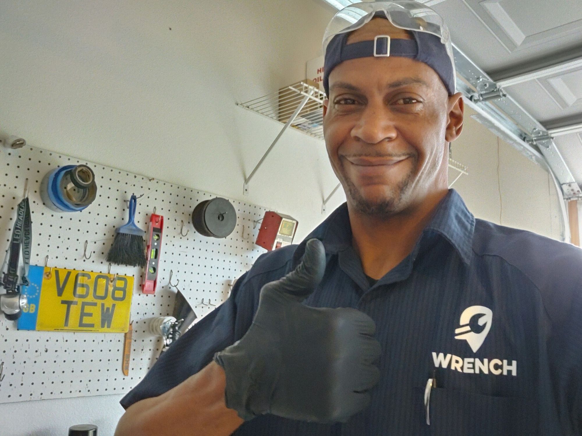 Wrench Mobile Mechanic And Auto Repair Technician In Garage